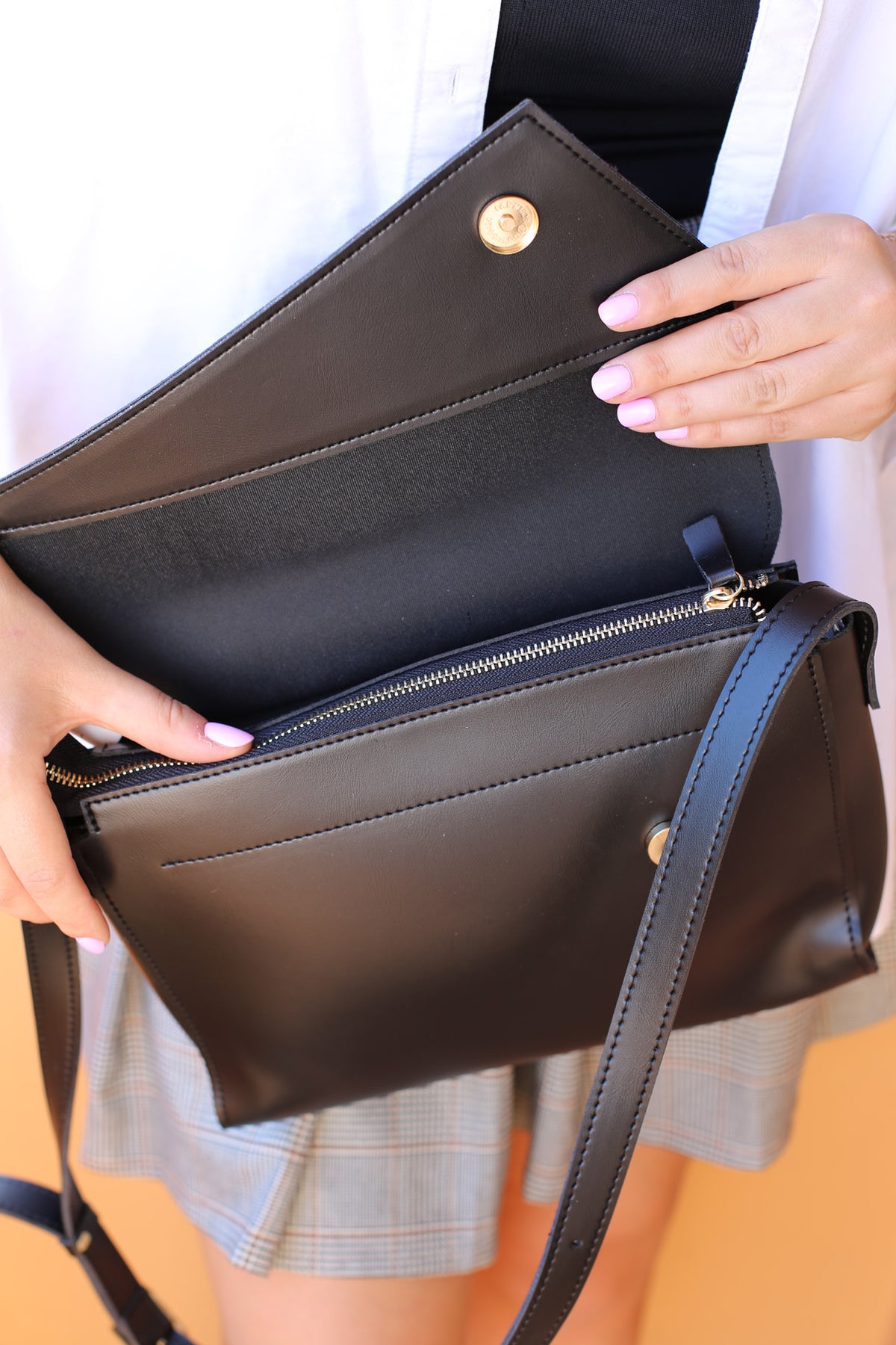 Bag with beveled flap