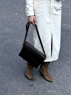 Bag with beveled flap