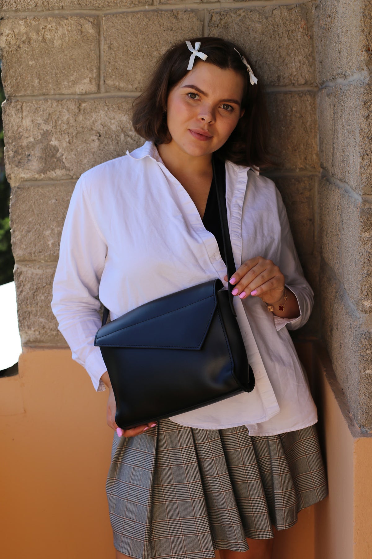 Bag with beveled flap
